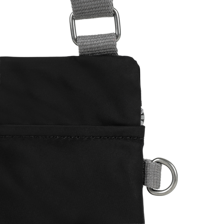 Chelsea Pocket Sling Bag in Black