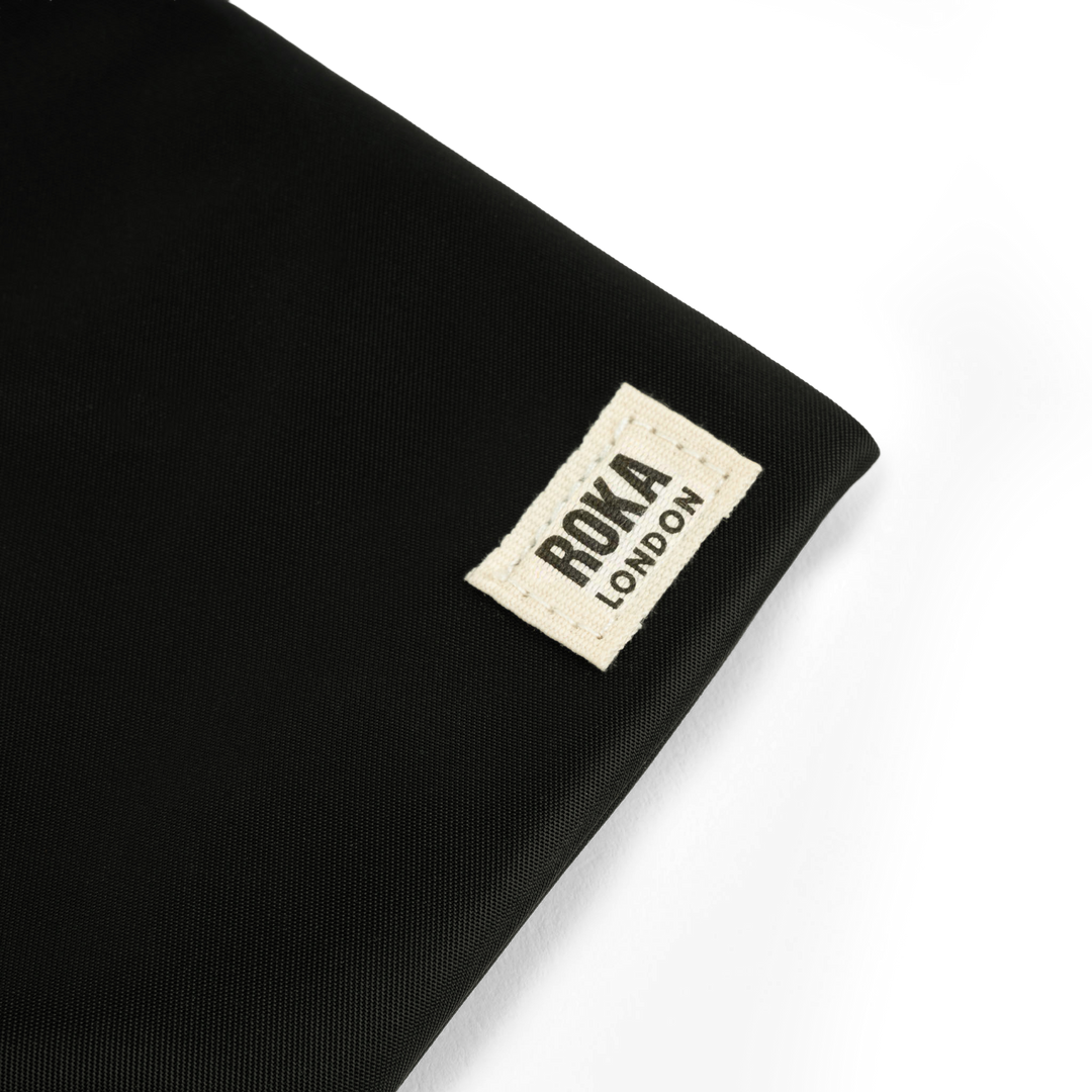 Chelsea Pocket Sling Bag in Black
