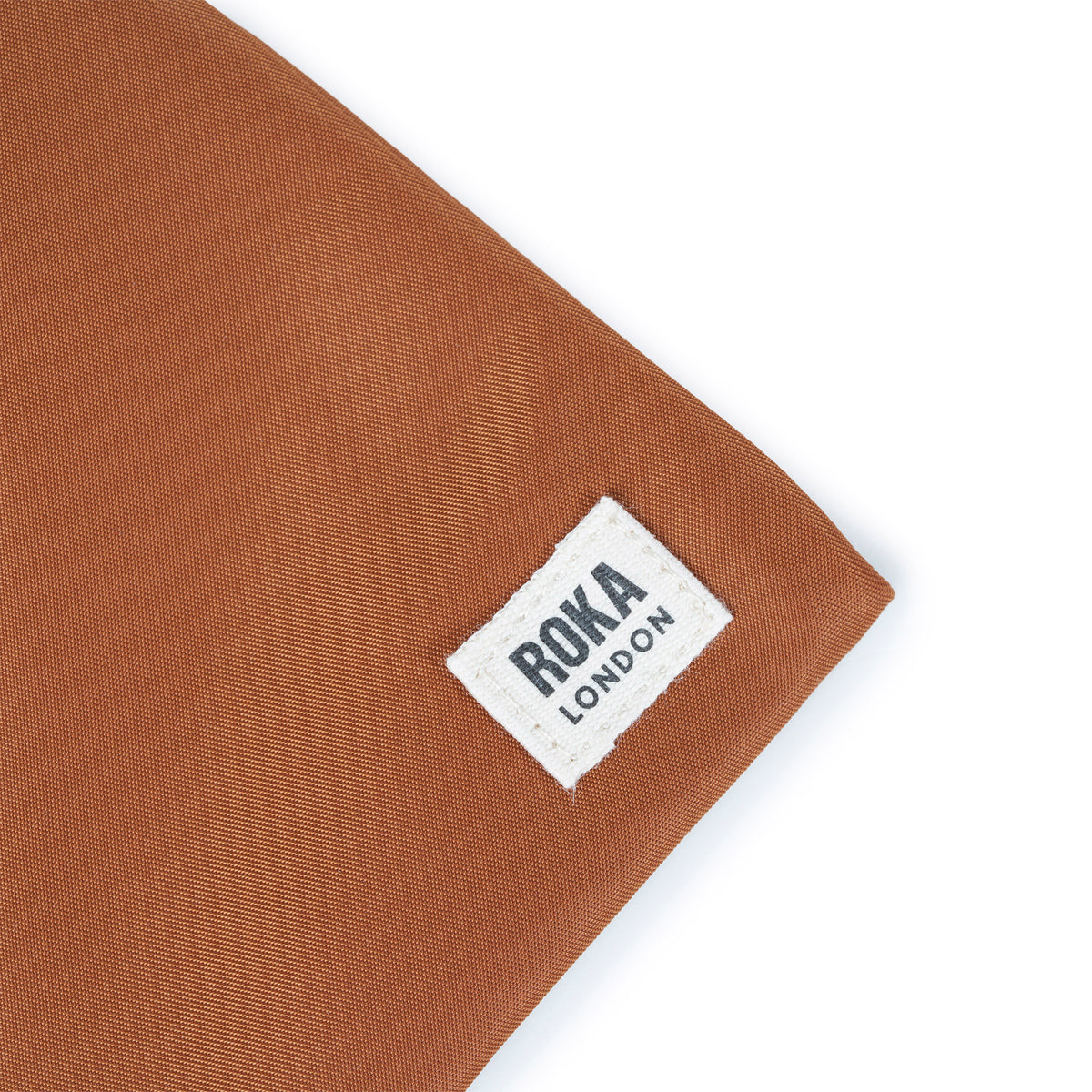 Chelsea Pocket Sling Bag in Bran