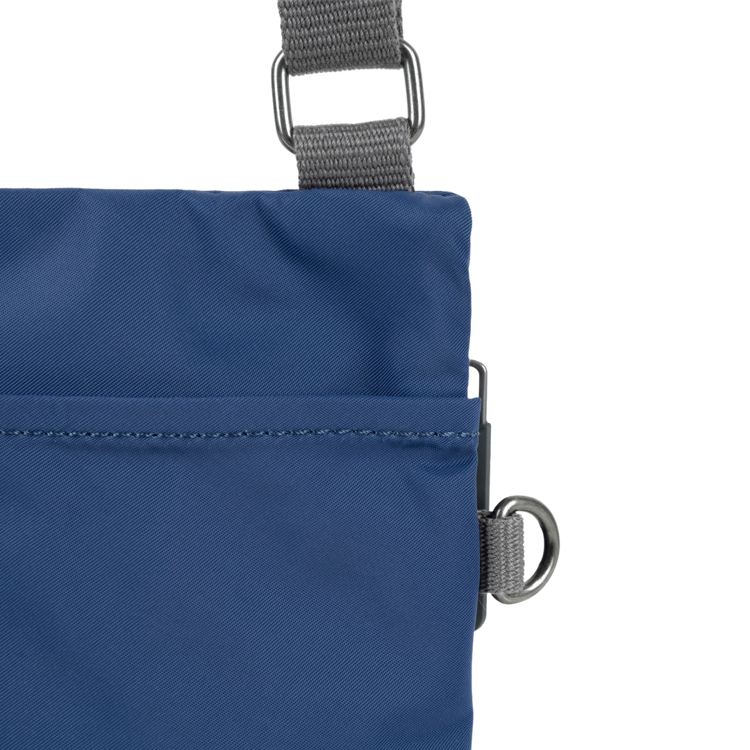 Chelsea Pocket Sling Bag in Burnt Blue