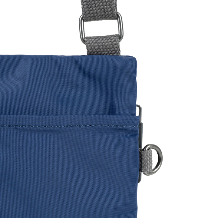 Chelsea Pocket Sling Bag in Burnt Blue