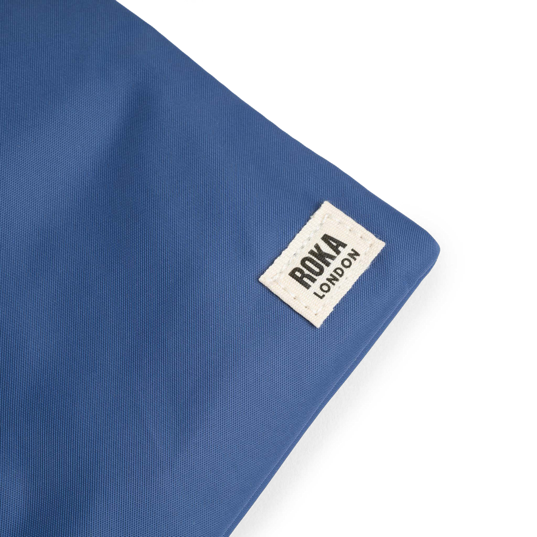 Chelsea Pocket Sling Bag in Burnt Blue