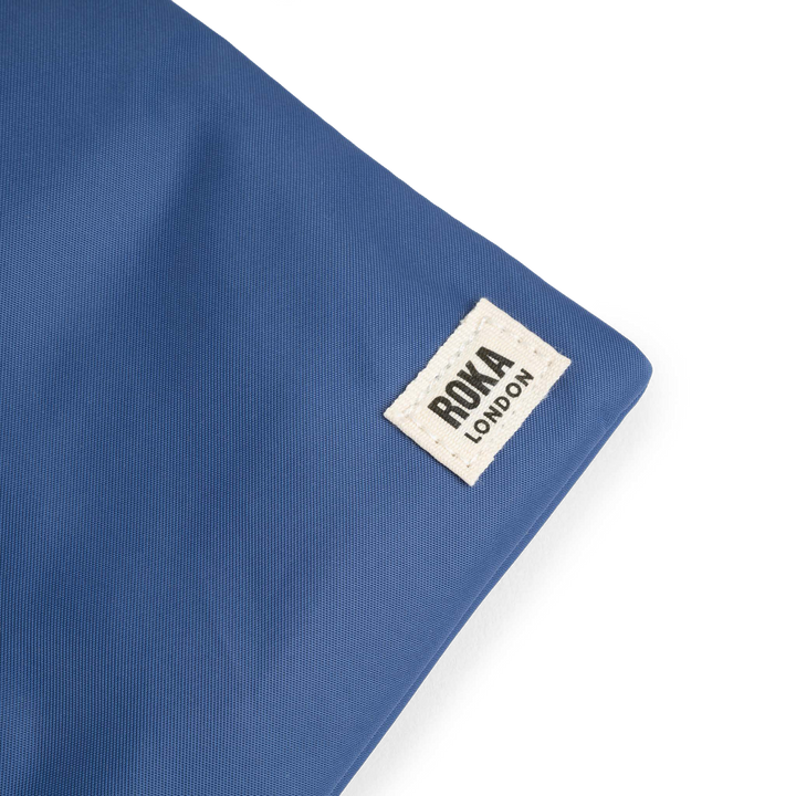 Chelsea Pocket Sling Bag in Burnt Blue