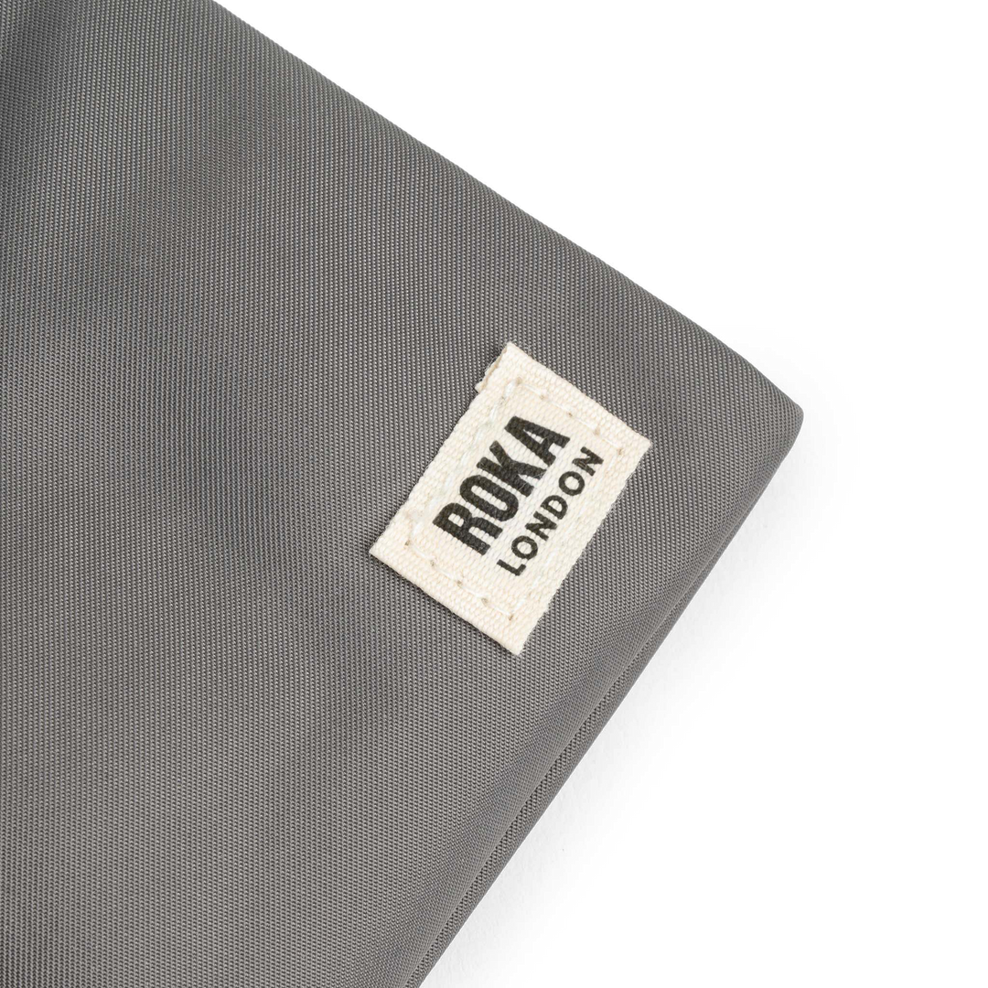 Chelsea Pocket Sling Bag in Graphite