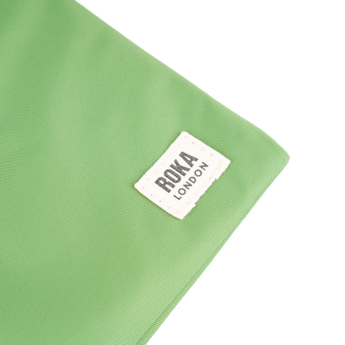 Chelsea Pocket Sling Bag in Kiwi
