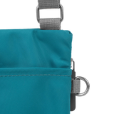 Chelsea Pocket Sling Bag in Marine