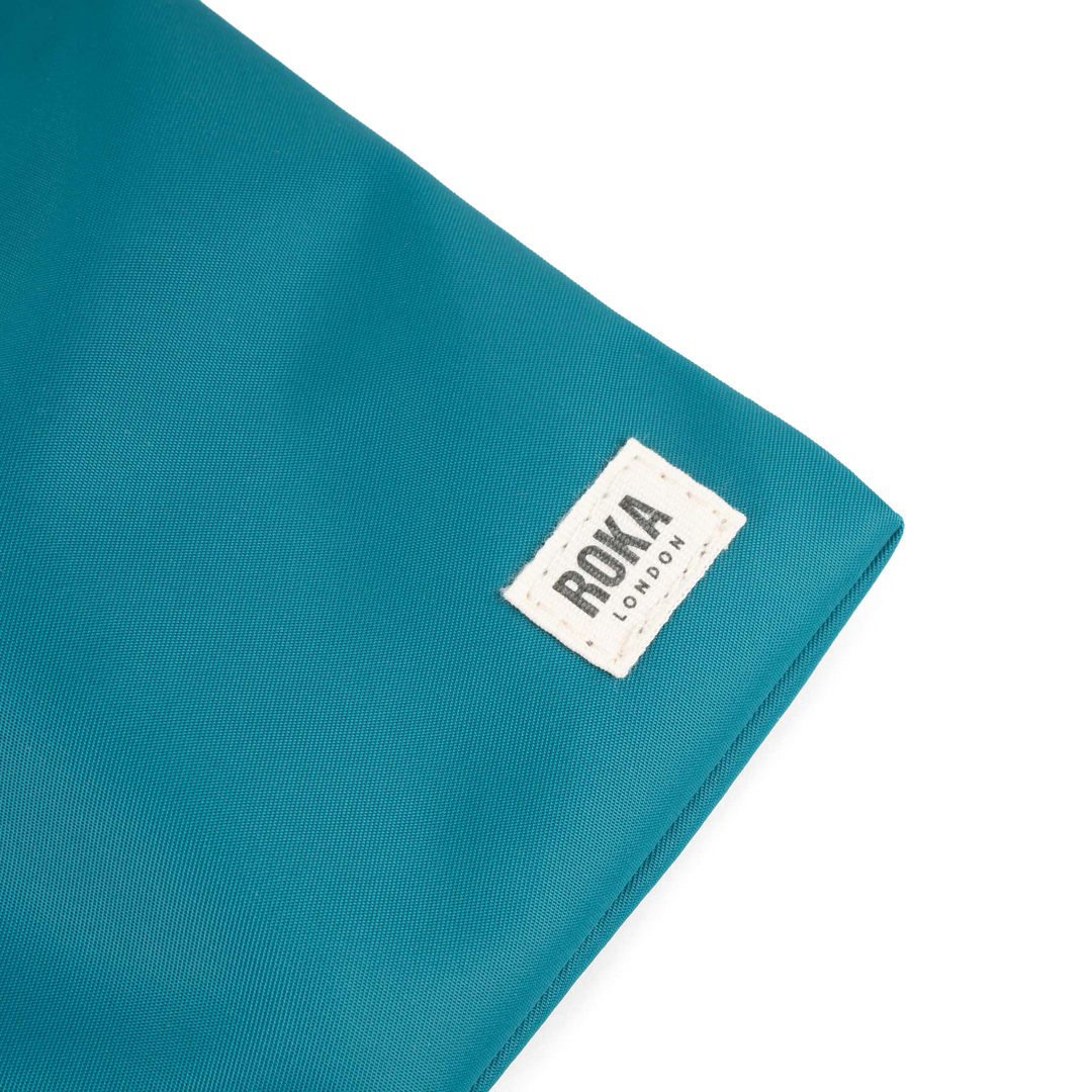 Chelsea Pocket Sling Bag in Marine