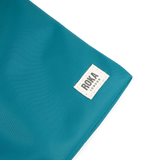 Chelsea Pocket Sling Bag in Marine
