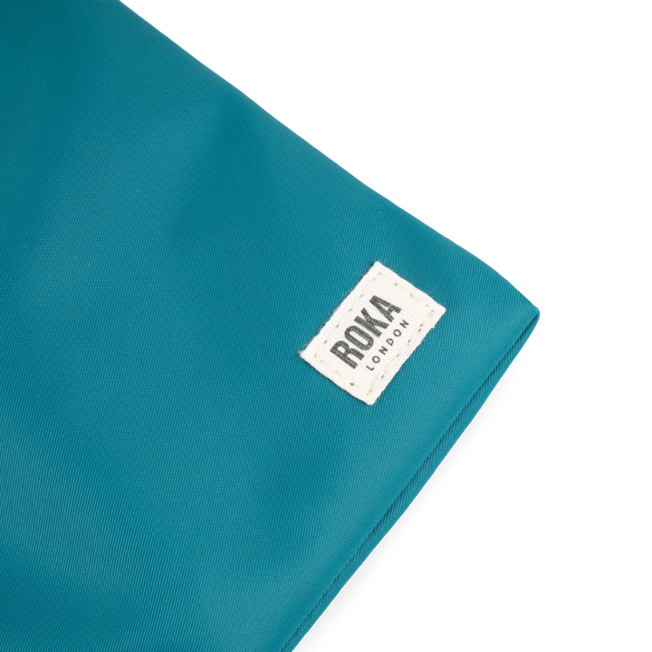 Chelsea Pocket Sling Bag in Marine