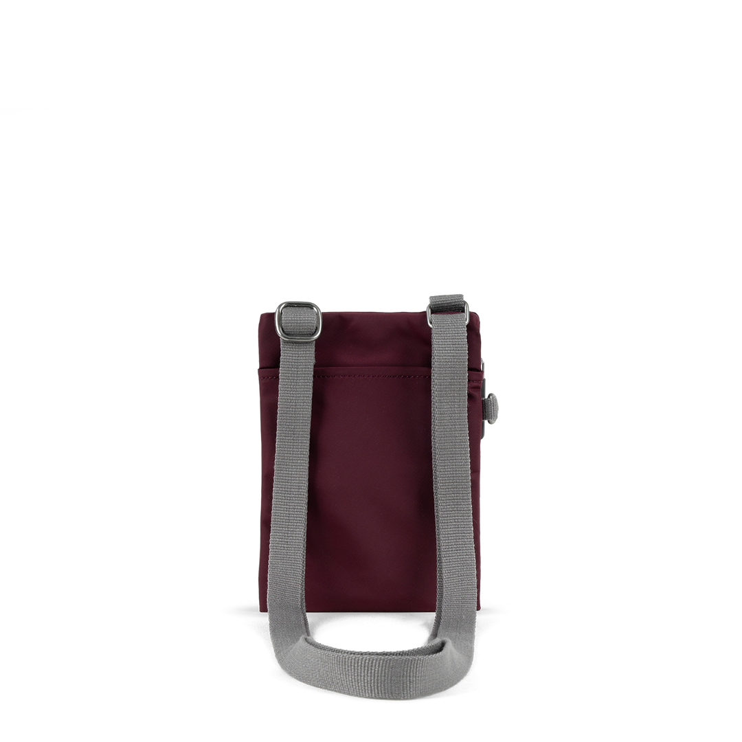 Chelsea Pocket Sling Bag in Plum