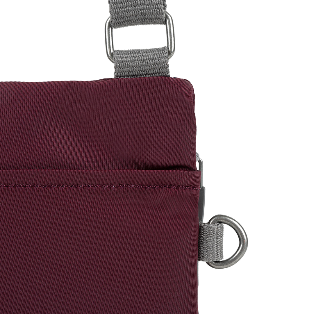 Chelsea Pocket Sling Bag in Plum