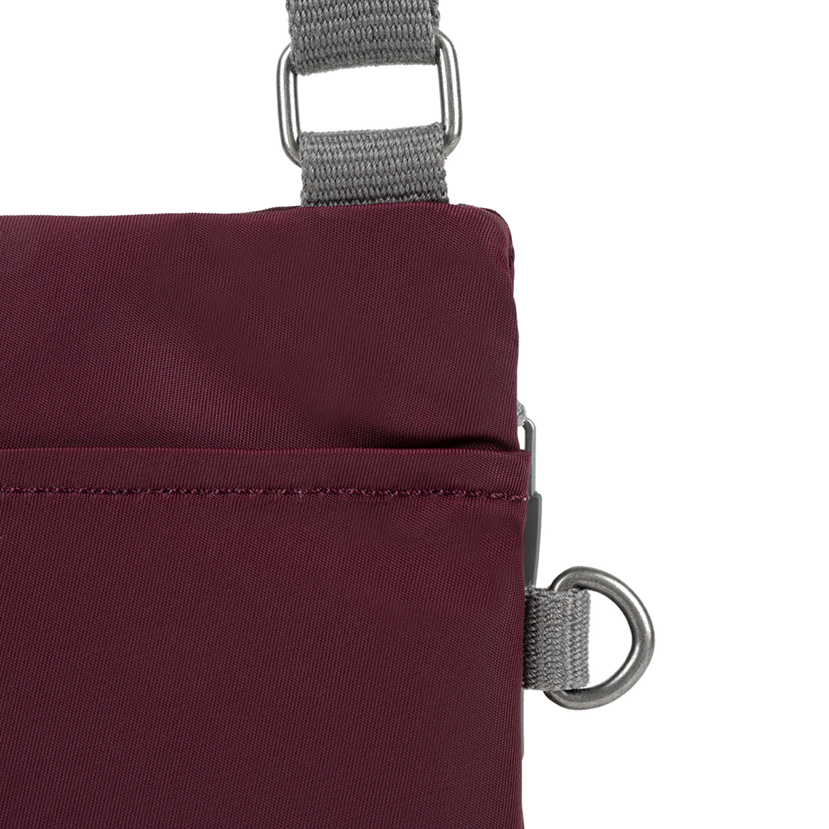 Chelsea Pocket Sling Bag in Plum