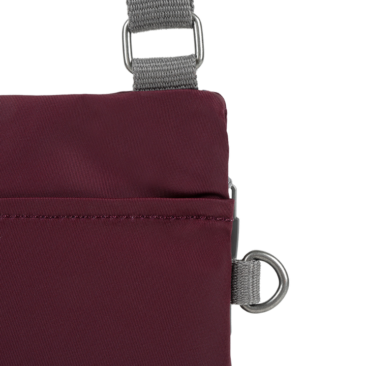 Chelsea Pocket Sling Bag in Plum