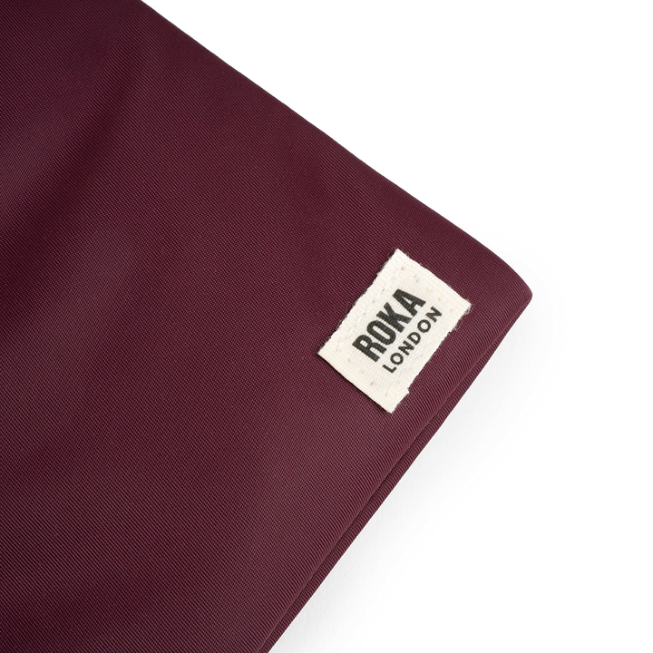 Chelsea Pocket Sling Bag in Plum
