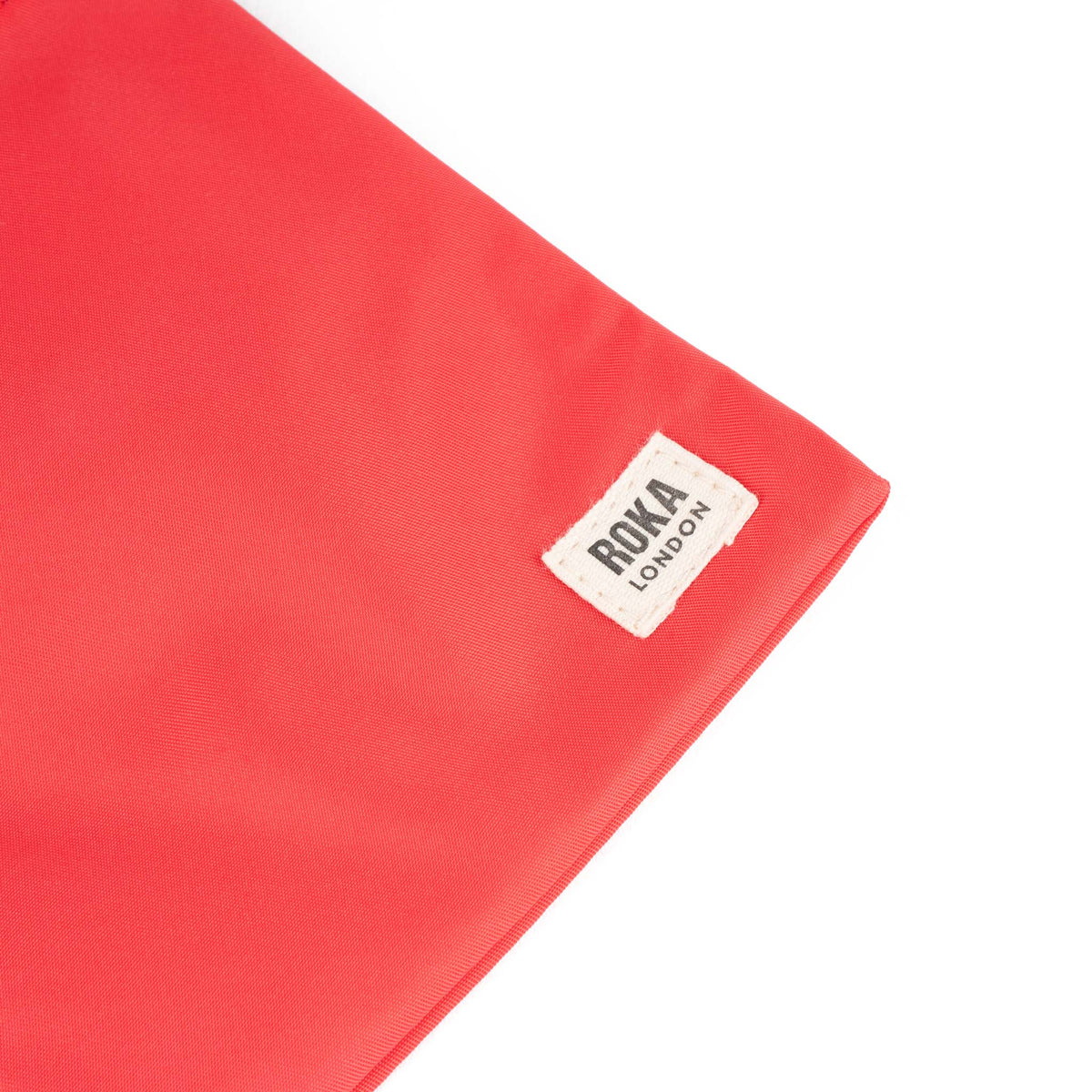 Chelsea Pocket Sling Bag in Poppy