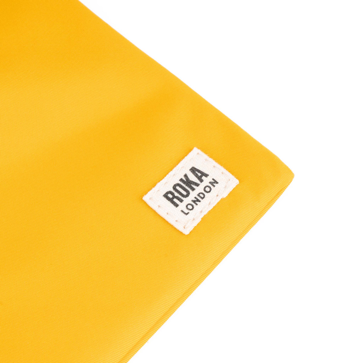 Chelsea Pocket Sling Bag in Saffron