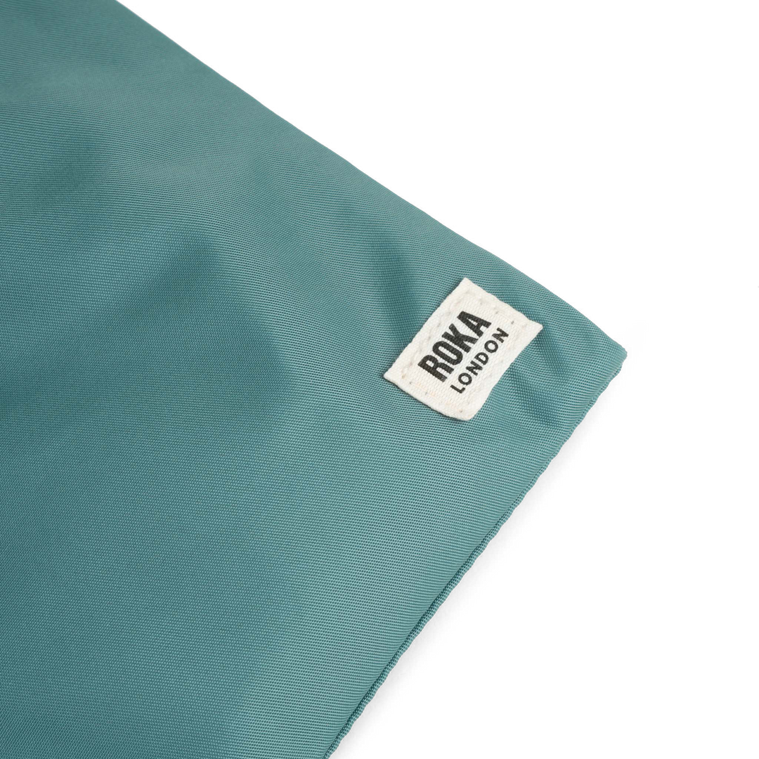 Chelsea Pocket Sling Bag in Sage