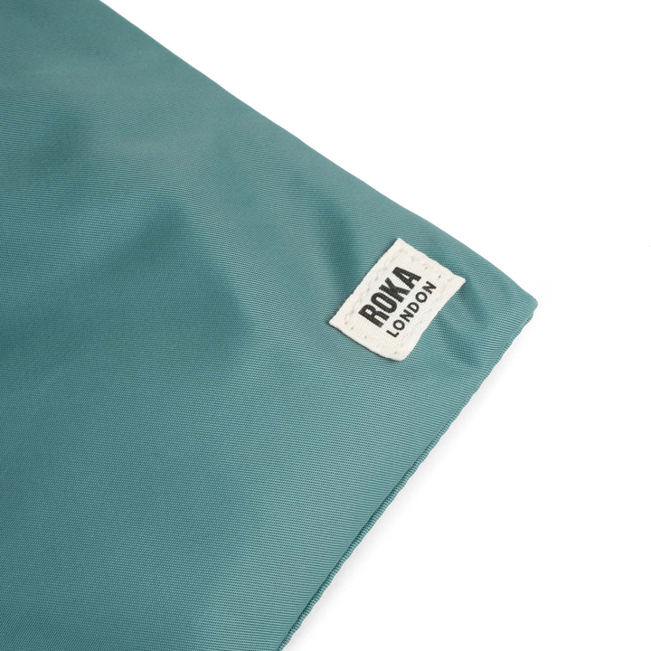 Chelsea Pocket Sling Bag in Sage