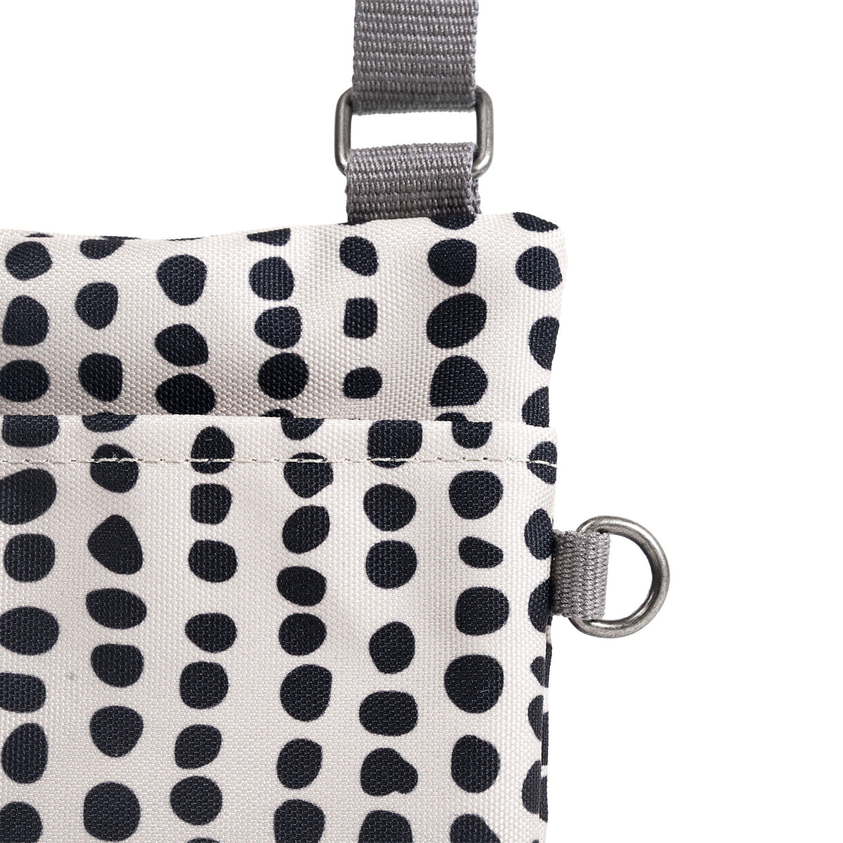 Chelsea Pocket Sling Bag in Linear Dot