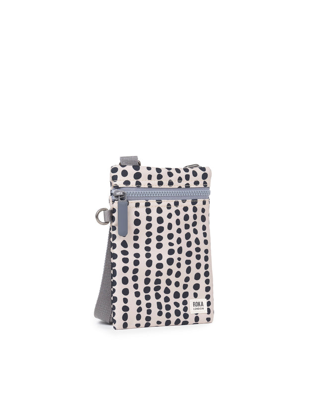 Chelsea Pocket Sling Bag in Linear Dot