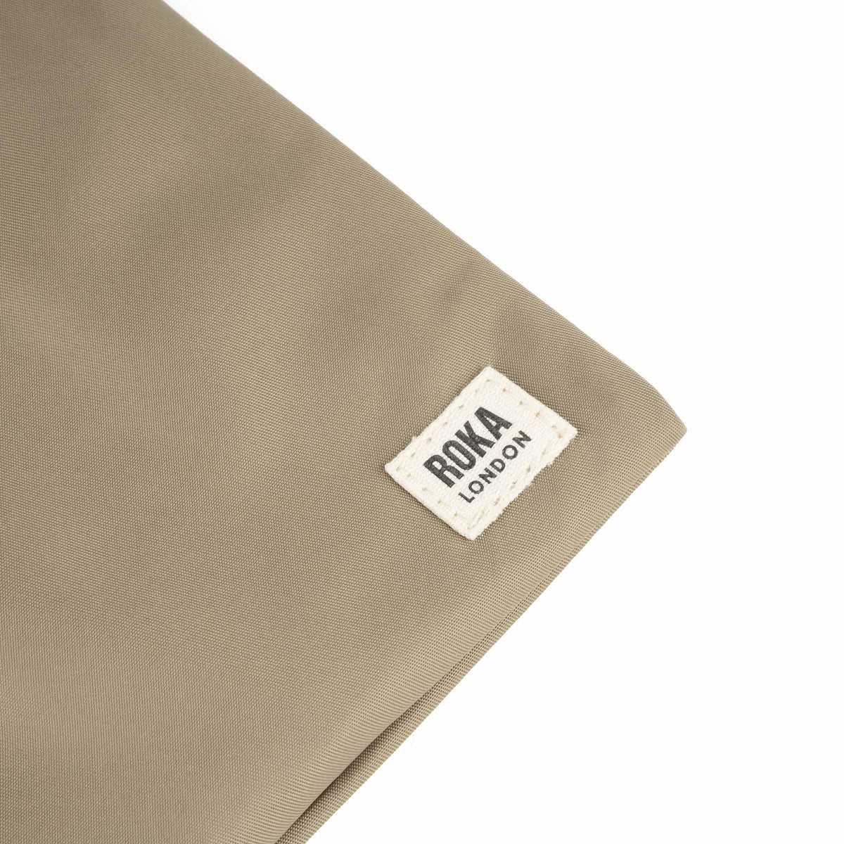 Chelsea Pocket Sling Bag in Taupe