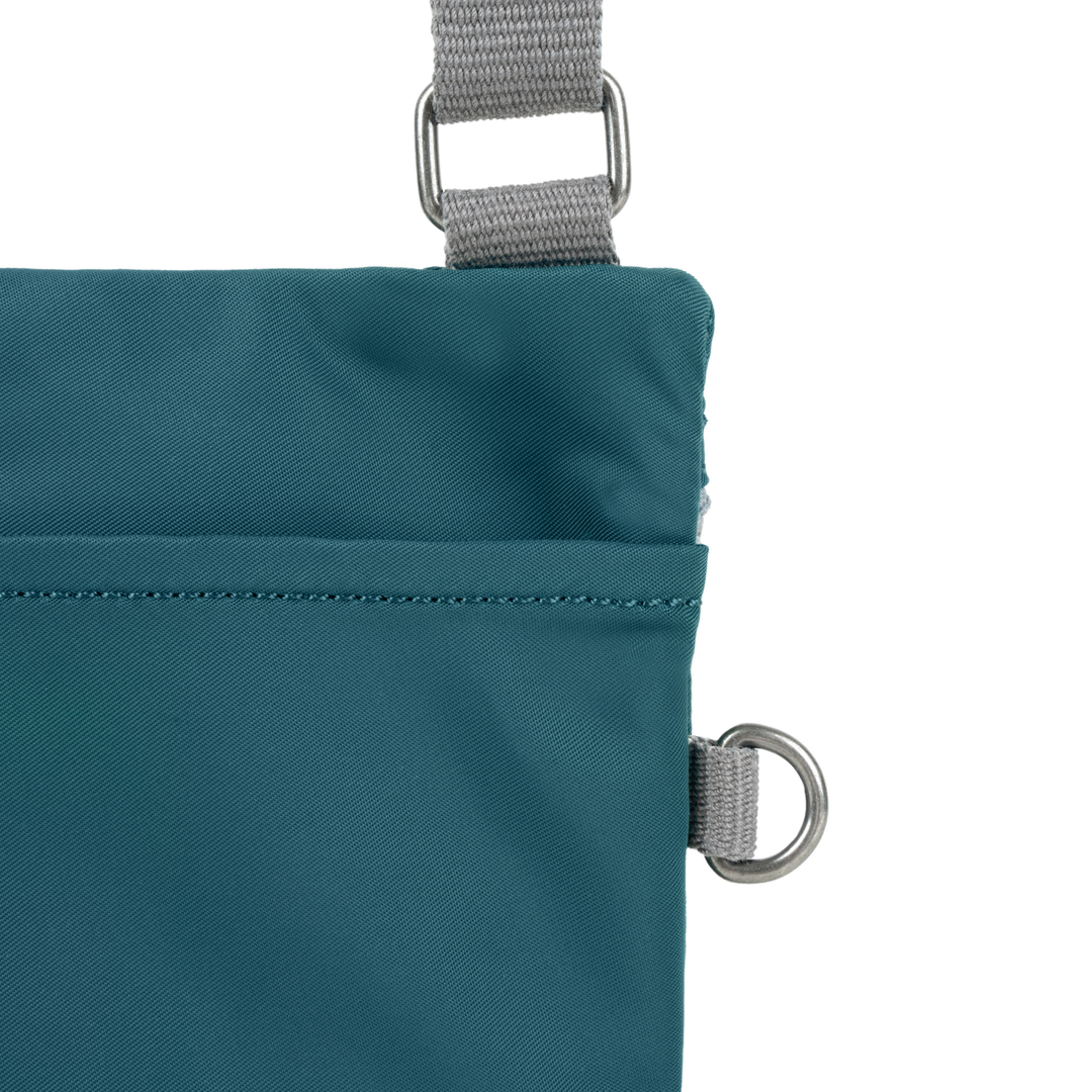 Chelsea Pocket Sling Bag in Teal