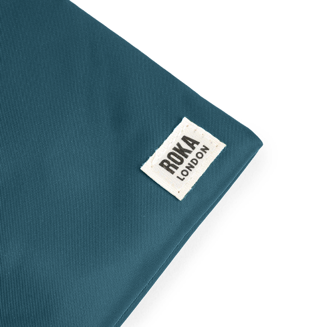 Chelsea Pocket Sling Bag in Teal