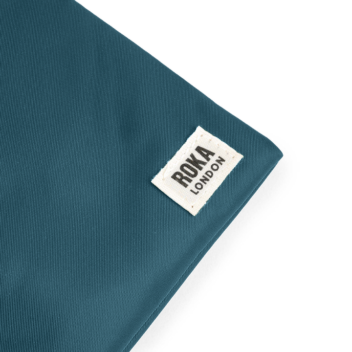 Chelsea Pocket Sling Bag in Teal