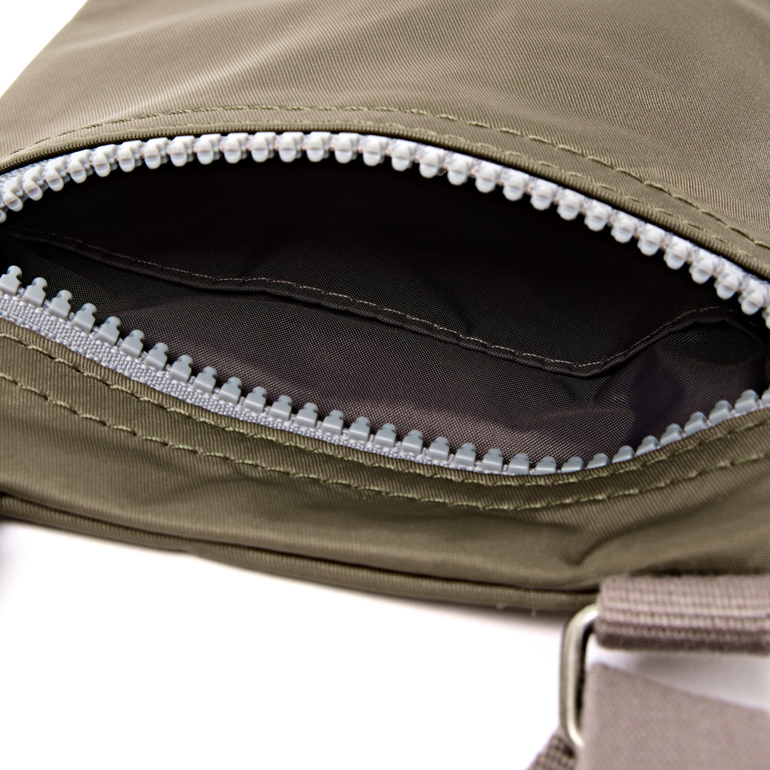 Chelsea Pocket Sling Bag in Army