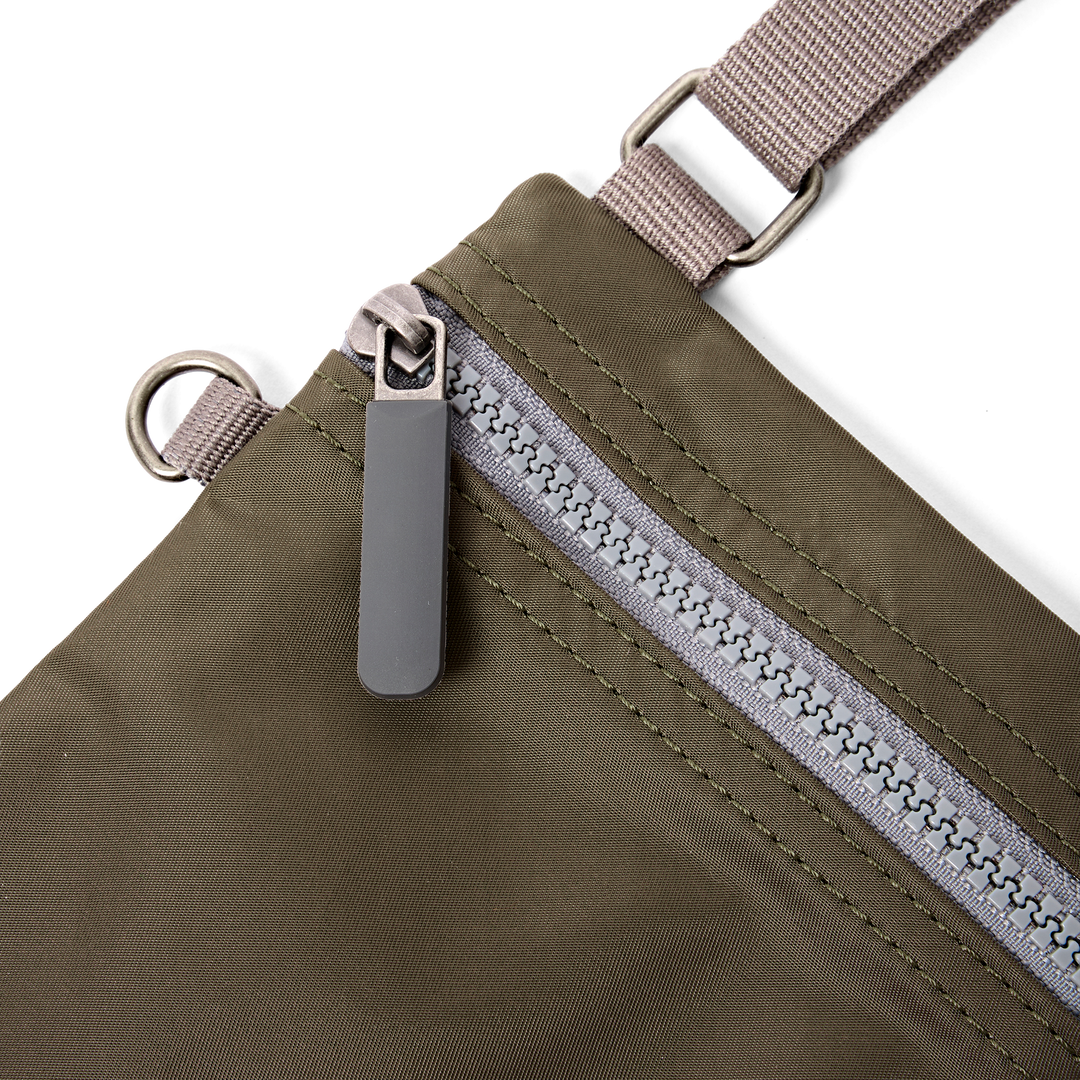 Chelsea Pocket Sling Bag in Army