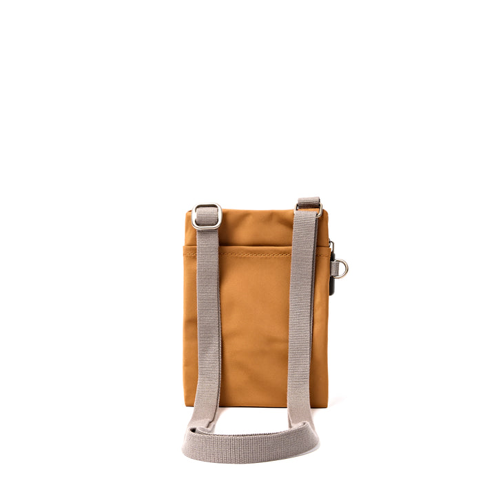 Chelsea Pocket Sling Bag in Biscuit