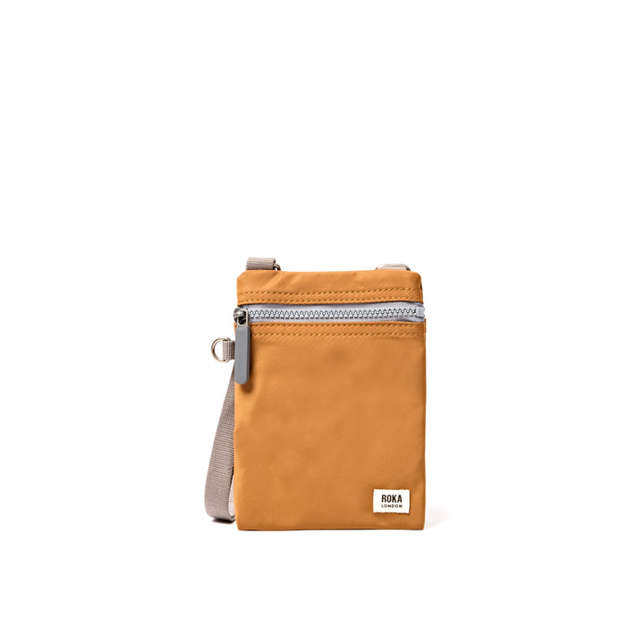 Chelsea Pocket Sling Bag in Biscuit