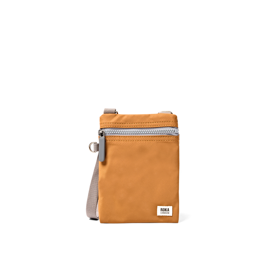 Chelsea Pocket Sling Bag in Biscuit