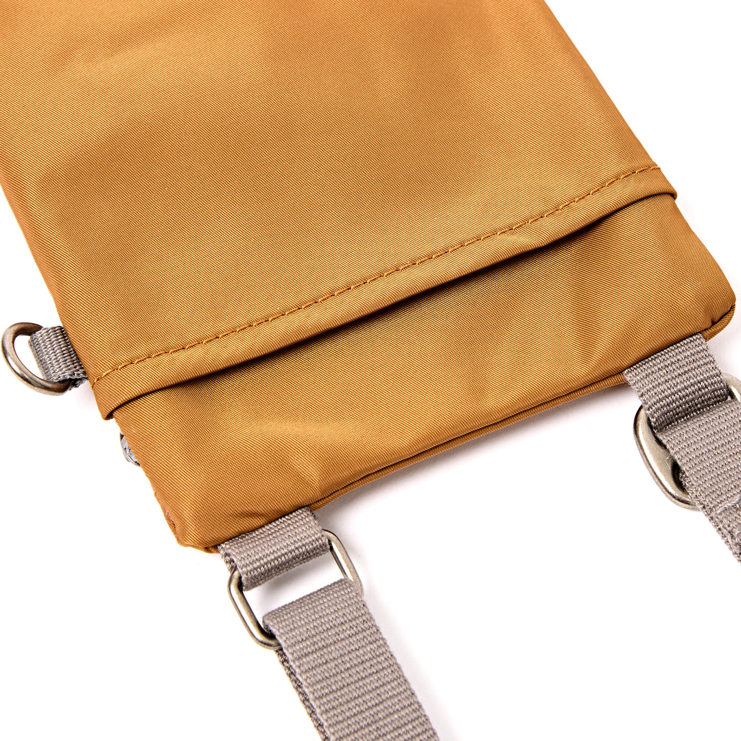 Chelsea Pocket Sling Bag in Biscuit