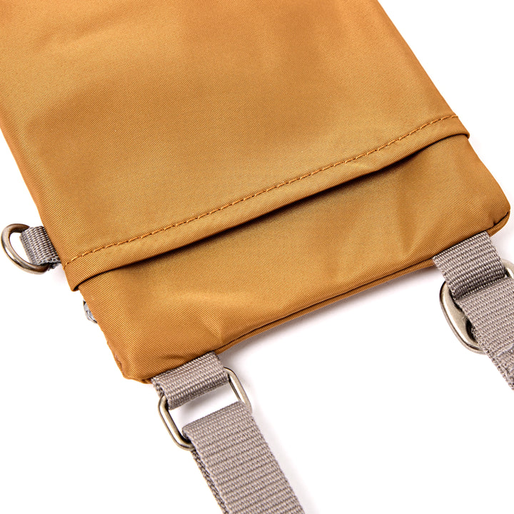Chelsea Pocket Sling Bag in Biscuit
