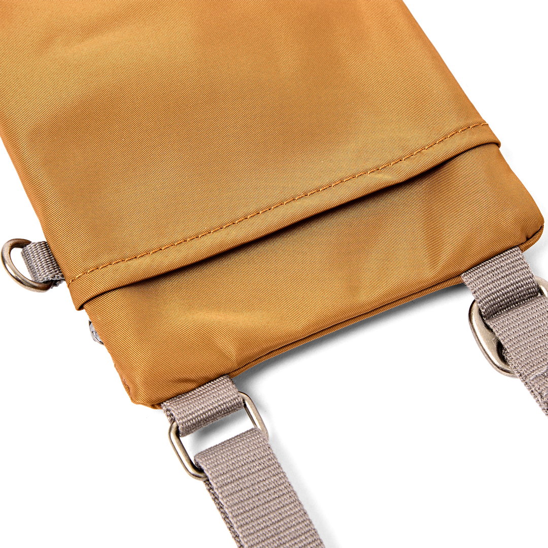 Chelsea Pocket Sling Bag in Biscuit