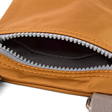 Chelsea Pocket Sling Bag in Biscuit
