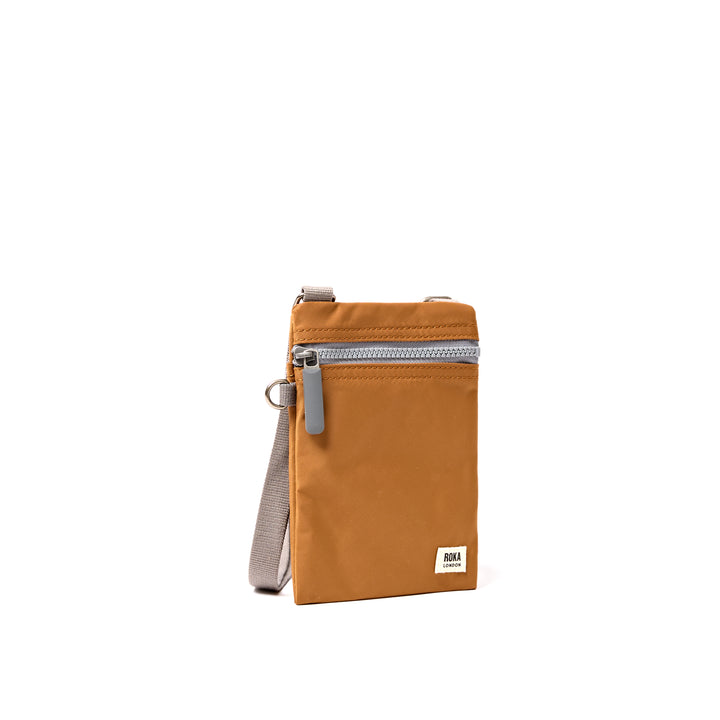 Chelsea Pocket Sling Bag in Biscuit