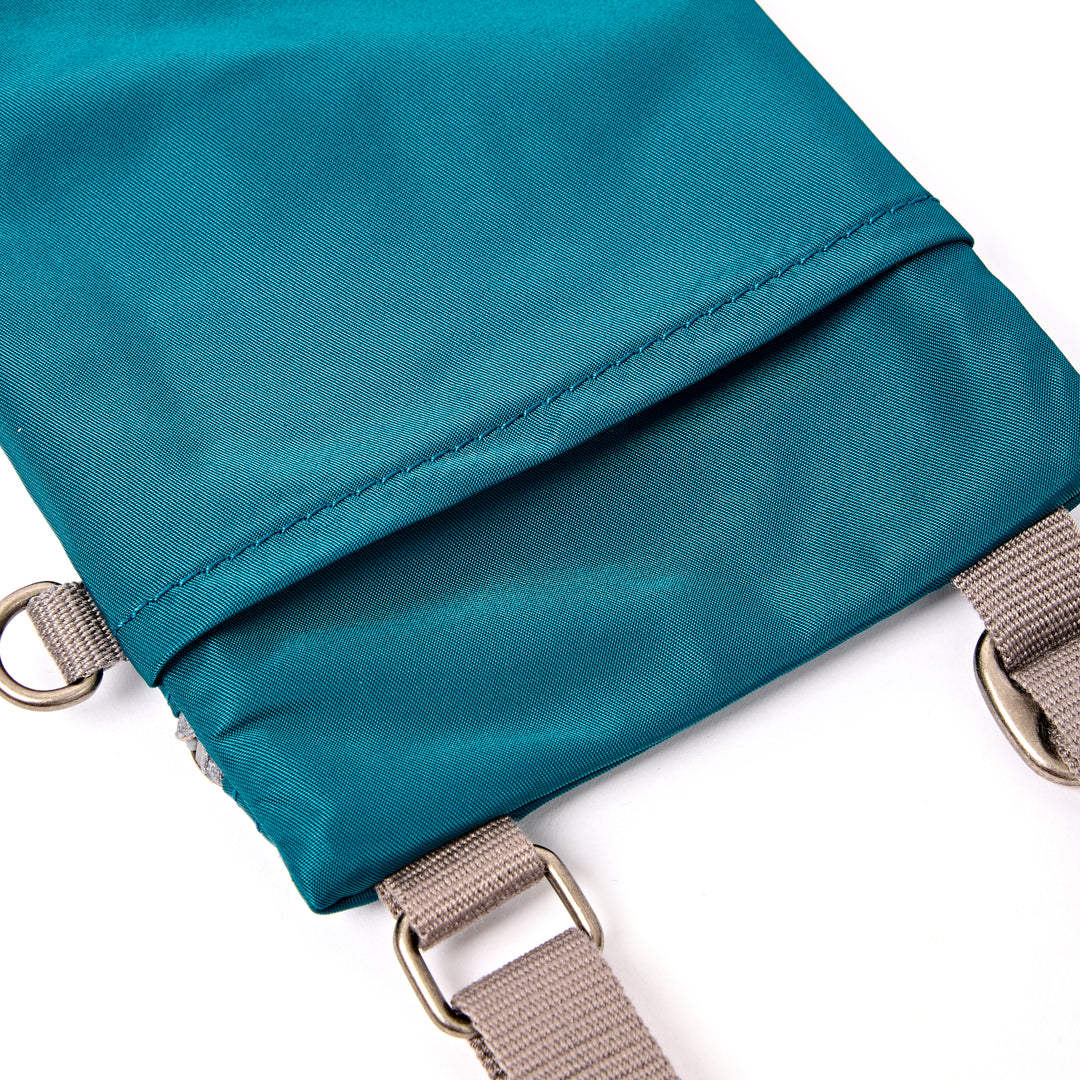 Chelsea Pocket Sling Bag in North Sea