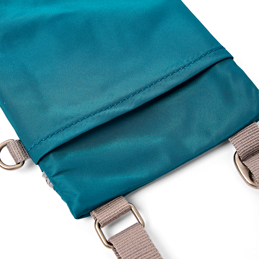 Chelsea Pocket Sling Bag in North Sea