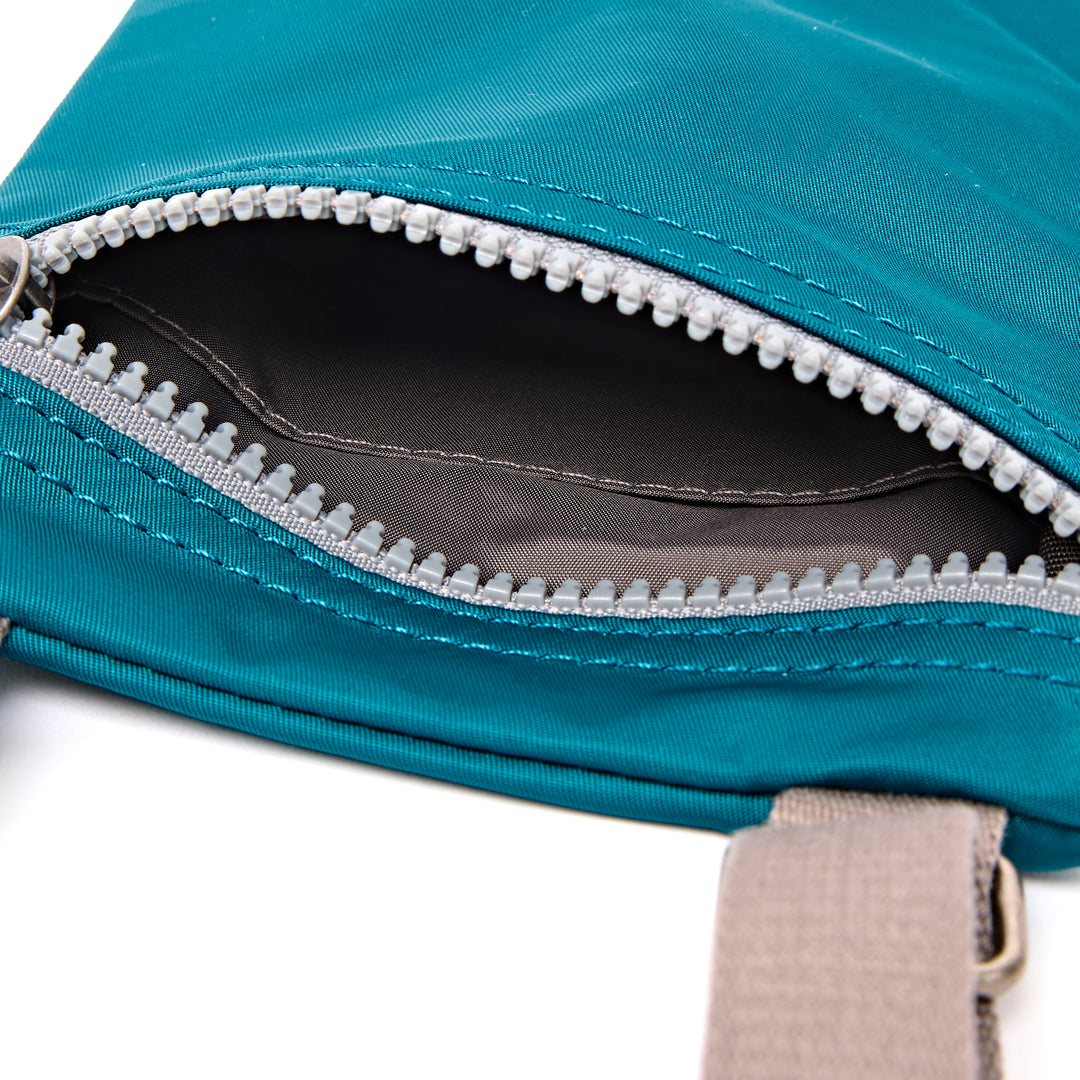 Chelsea Pocket Sling Bag in North Sea