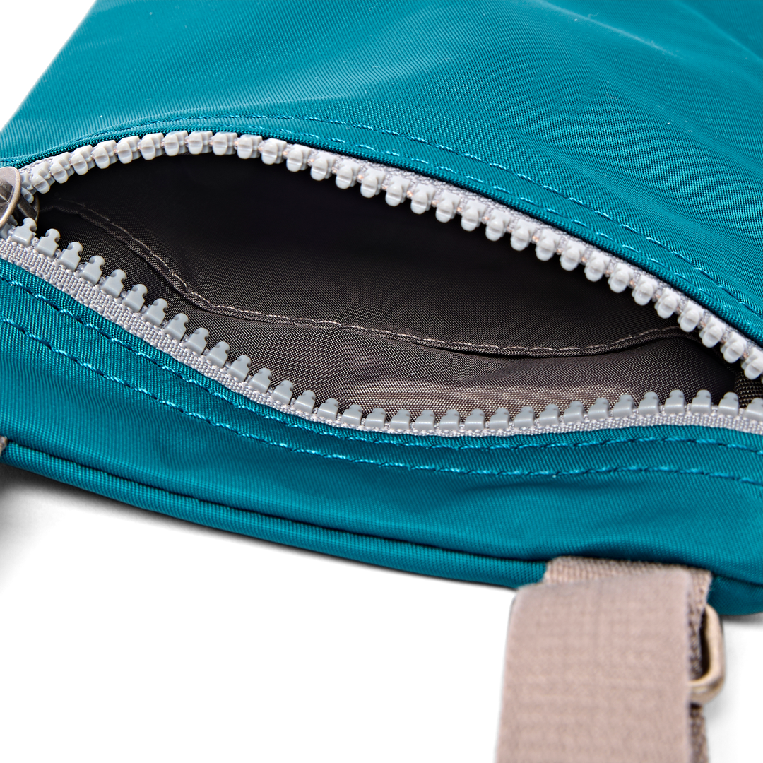 Chelsea Pocket Sling Bag in North Sea