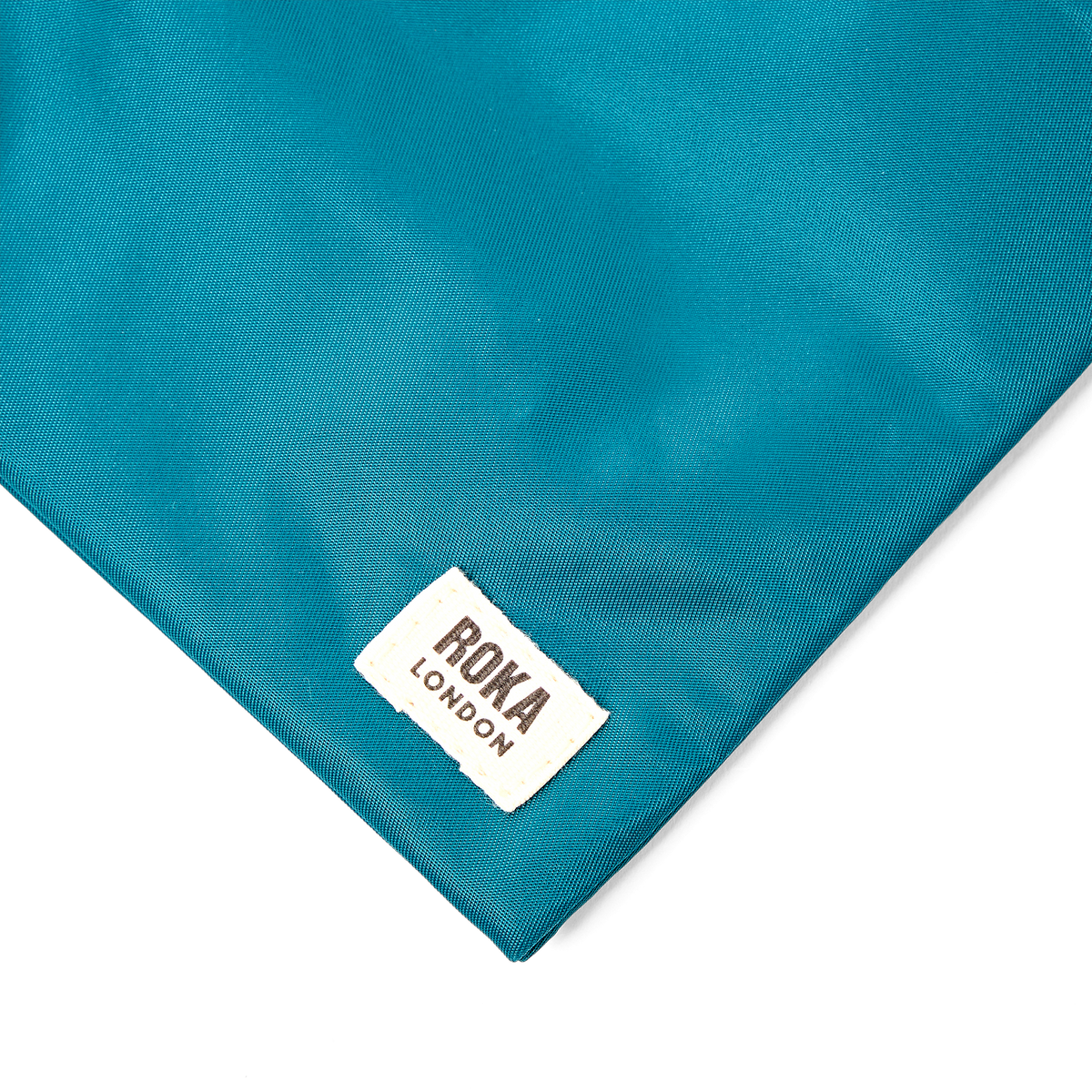 Chelsea Pocket Sling Bag in North Sea