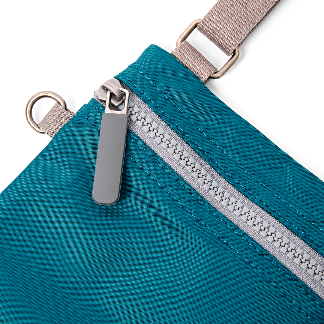 Chelsea Pocket Sling Bag in North Sea