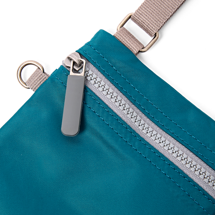 Chelsea Pocket Sling Bag in North Sea