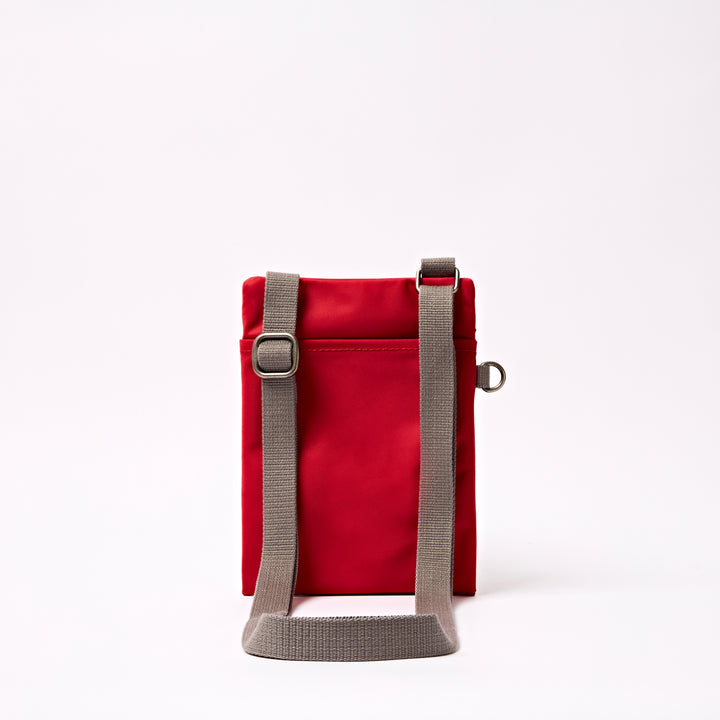 Chelsea Pocket Sling Bag in Cranberry Stripe