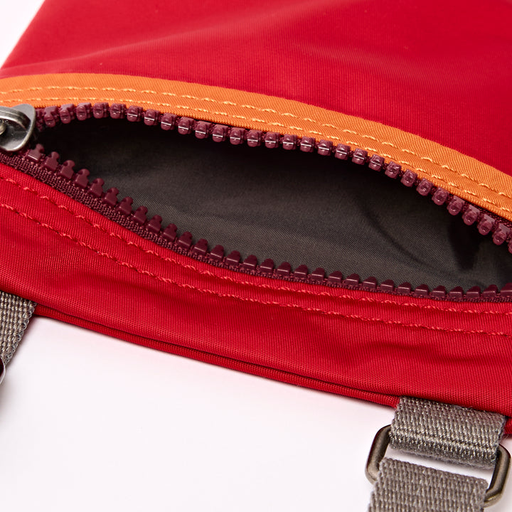 Chelsea Pocket Sling Bag in Cranberry Stripe