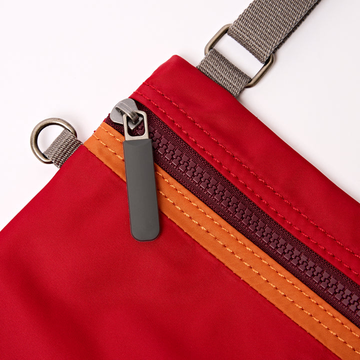 Chelsea Pocket Sling Bag in Cranberry Stripe