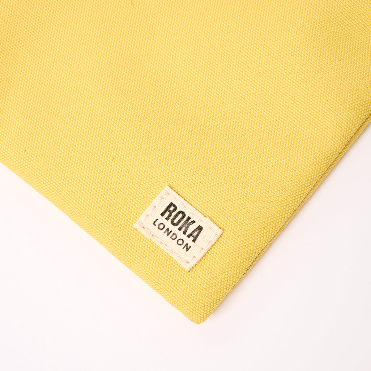 Chelsea Pocket Sling Bag in Lemonade Stripe