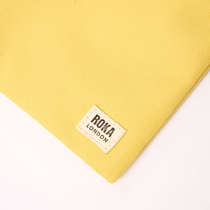Chelsea Pocket Sling Bag in Lemonade Stripe